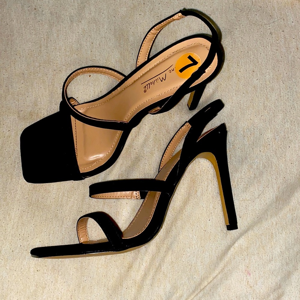 Size 7 black sling heels, never worn